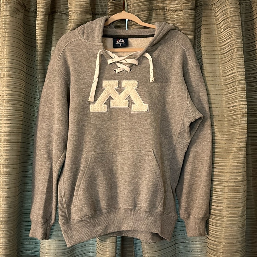 “J America” Minnesota Lace up Hoodie. Color: Grey. Size: S.